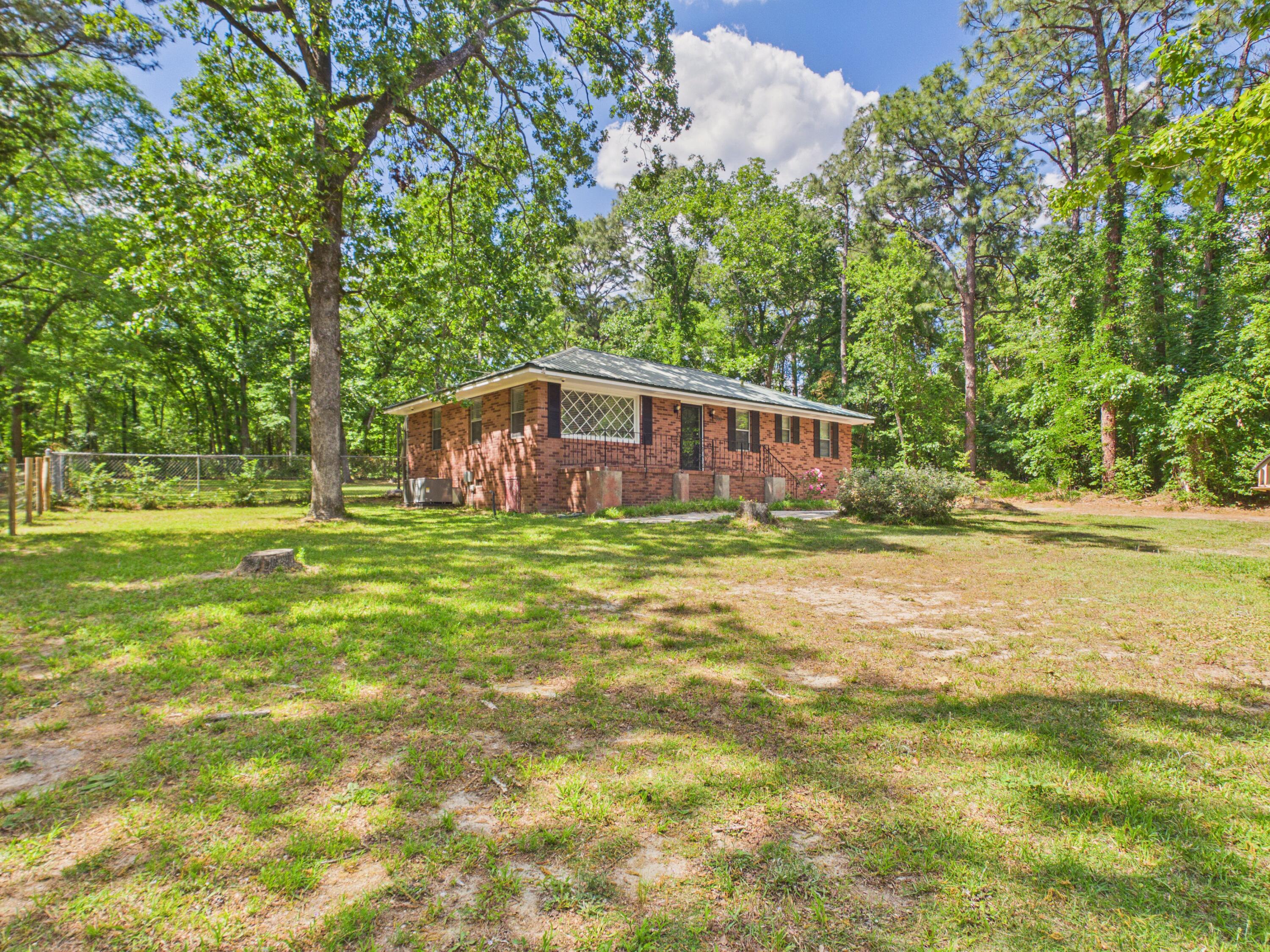 800 Old Whiskey Road South New Ellenton, SC 29809 - Photo 21 of 31 a house view with a garden space