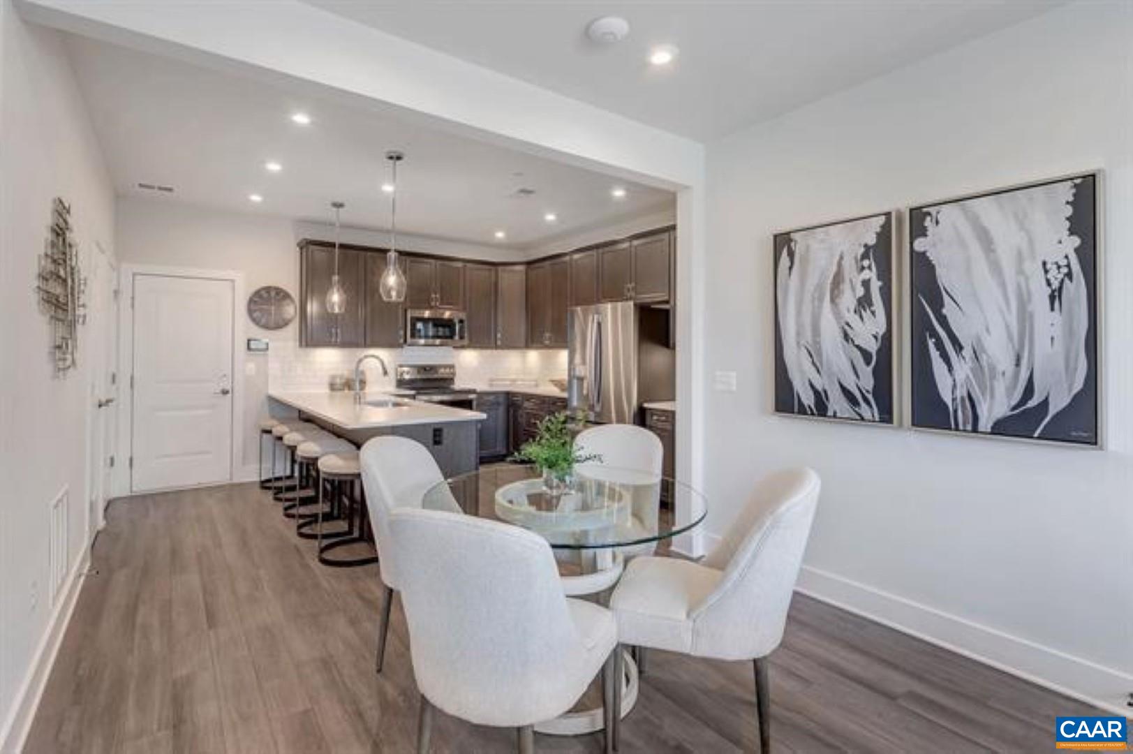 828 A Wesley Lane, Unit A Charlottesville, VA 22911 - Photo 17 of 33 a dining room with furniture and window