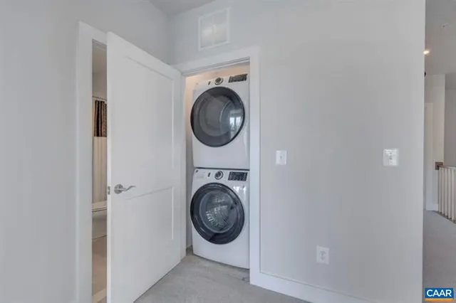 a view of washer and dryer in a utility room