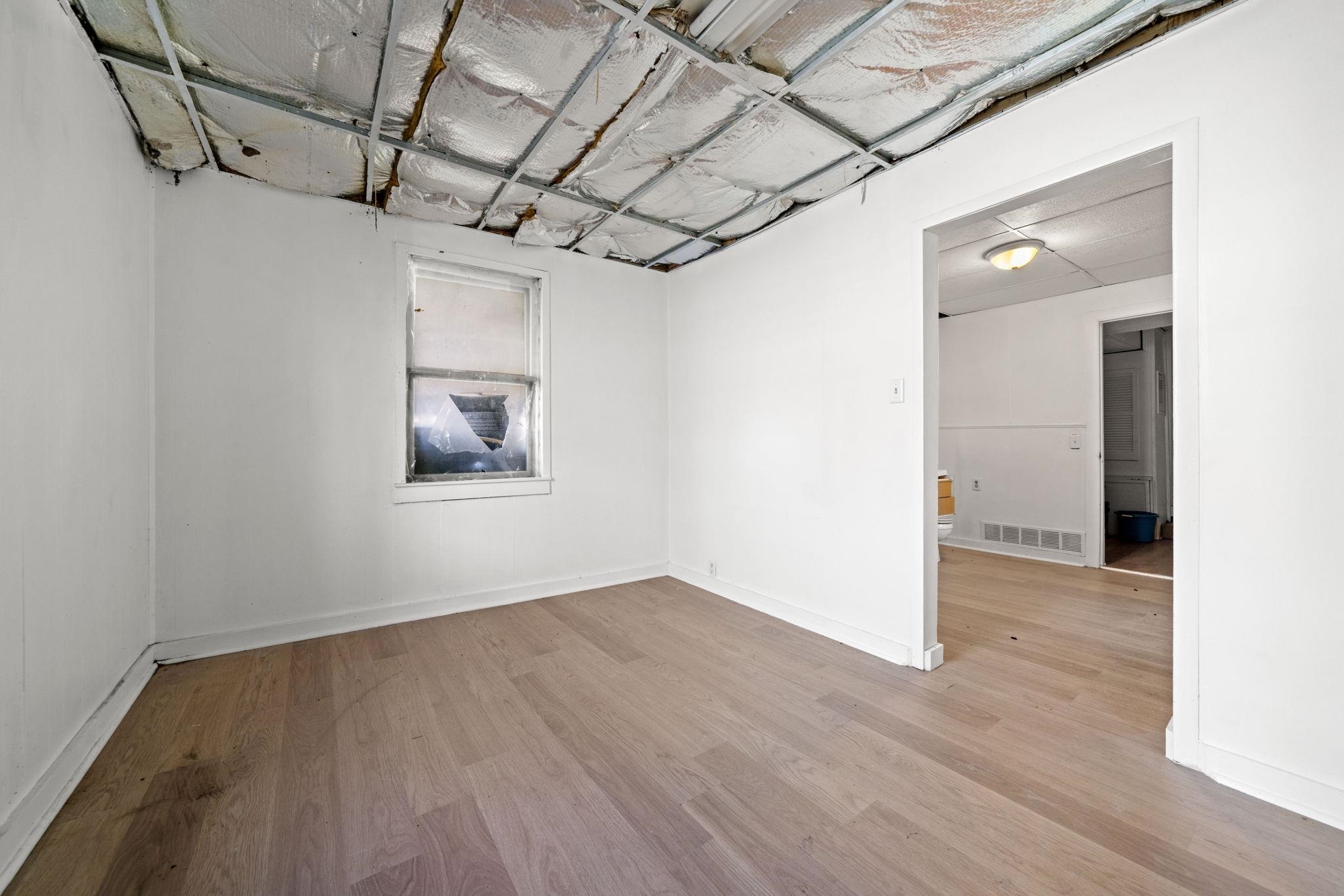 1884 Will James Road Rockford, IL 61109 - Photo 2 of 26 a view of empty room with wooden floor