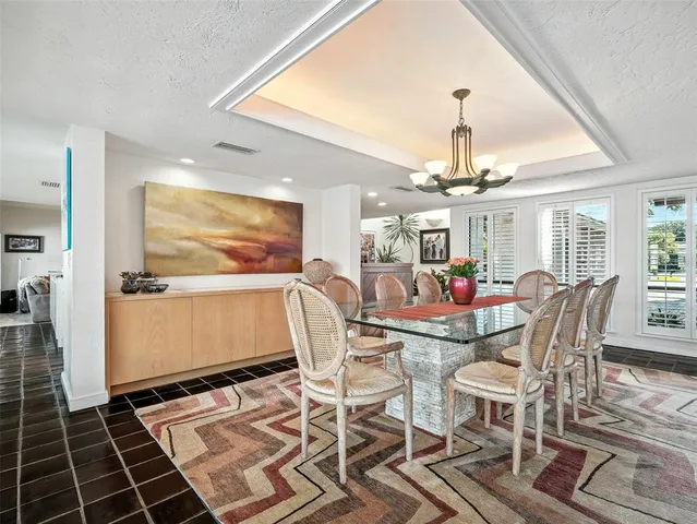 a kitchen with a stove a sink and a refrigerator