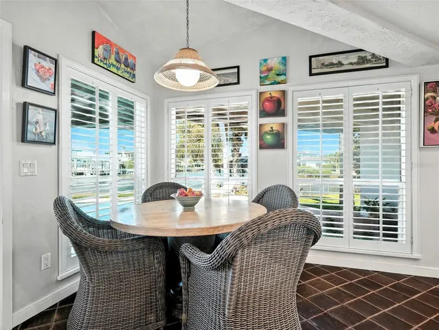 an aerial view of a house with a lake view