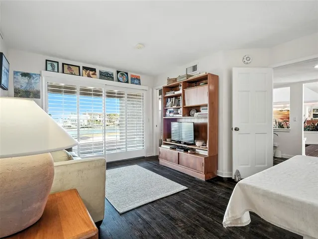 a bathroom with a bathtub shower a toilet and a sink