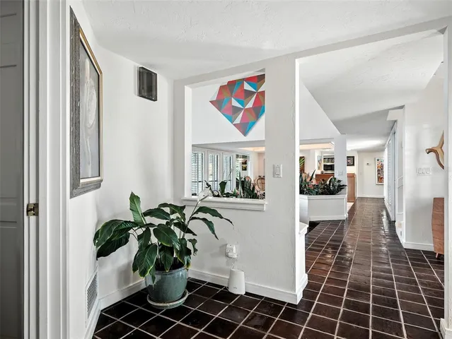 a bathroom with a sink toilet and mirror