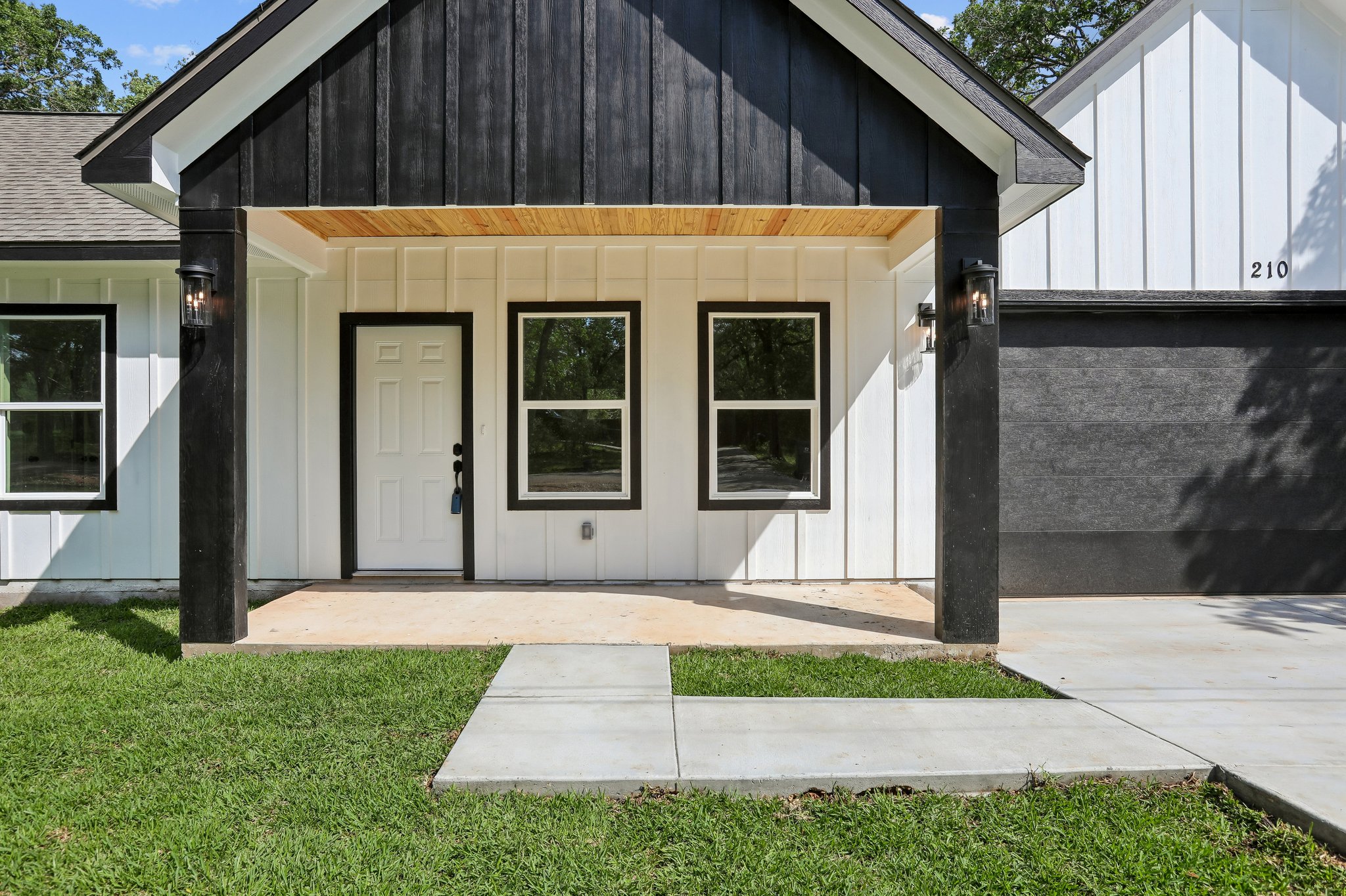 210 Flint Ridge Street Bastrop, TX 78602 - Photo 5 of 40 a view of a house with a yard