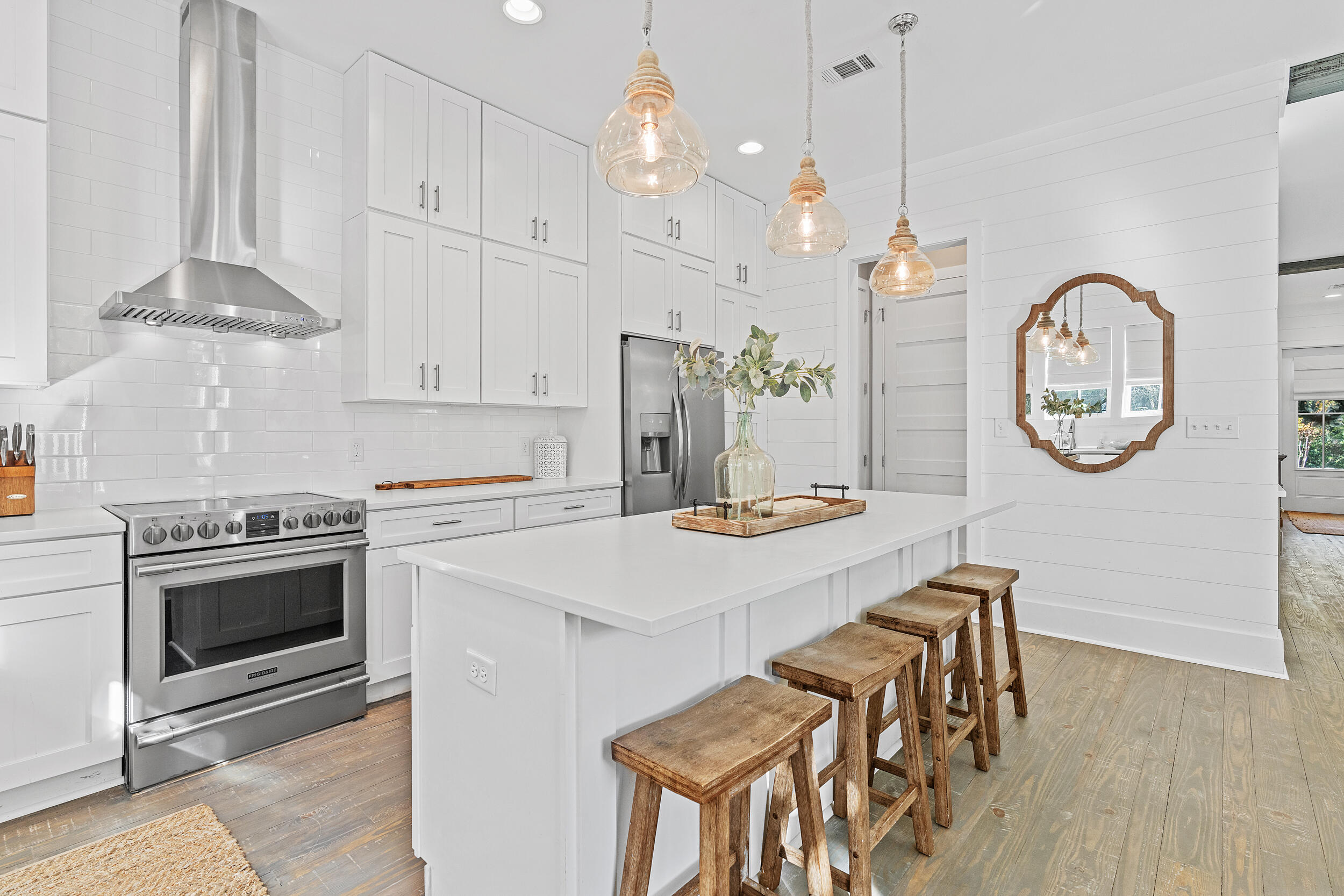 17 Pompano Court Inlet Beach, FL 32461 - Photo 16 of 48 a kitchen with cabinets and wooden floor