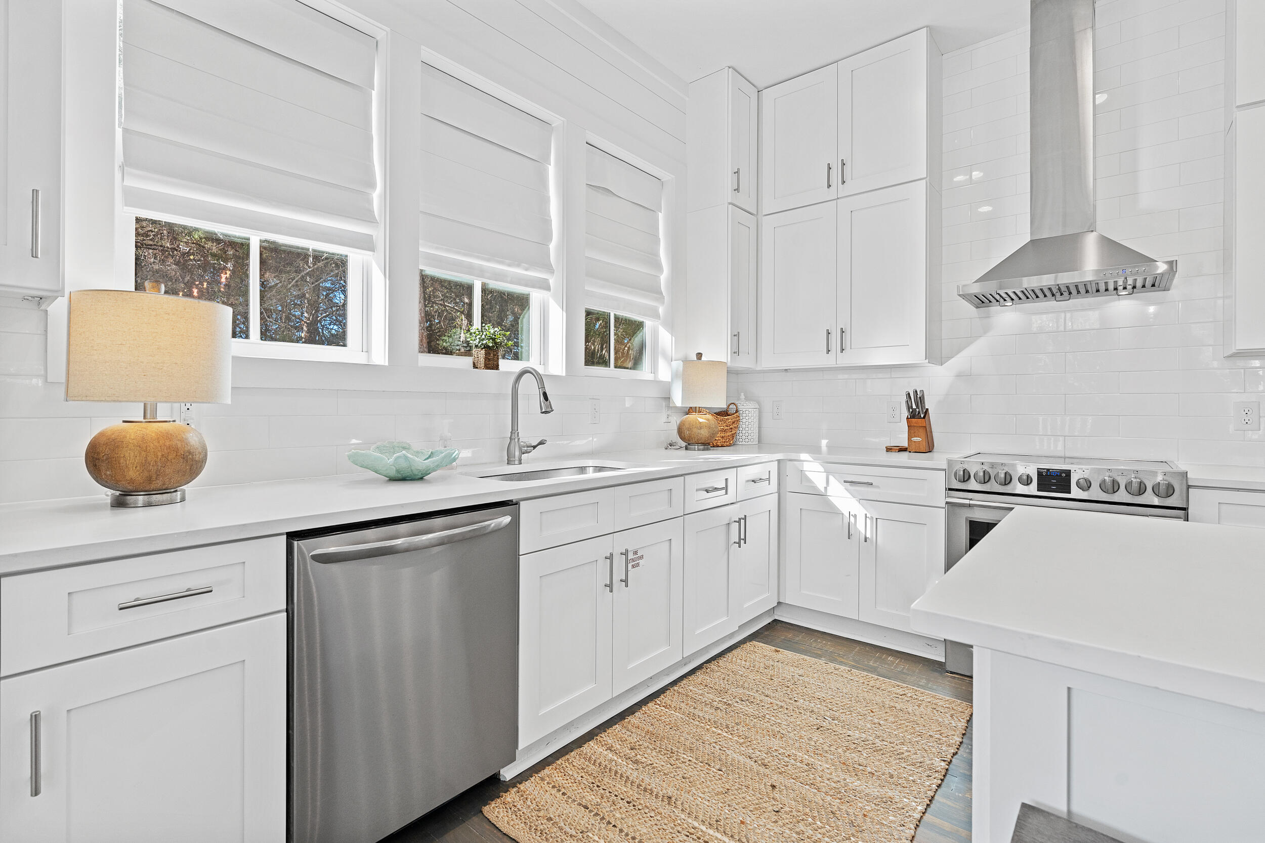 17 Pompano Court Inlet Beach, FL 32461 - Photo 18 of 48 a kitchen with cabinets and window