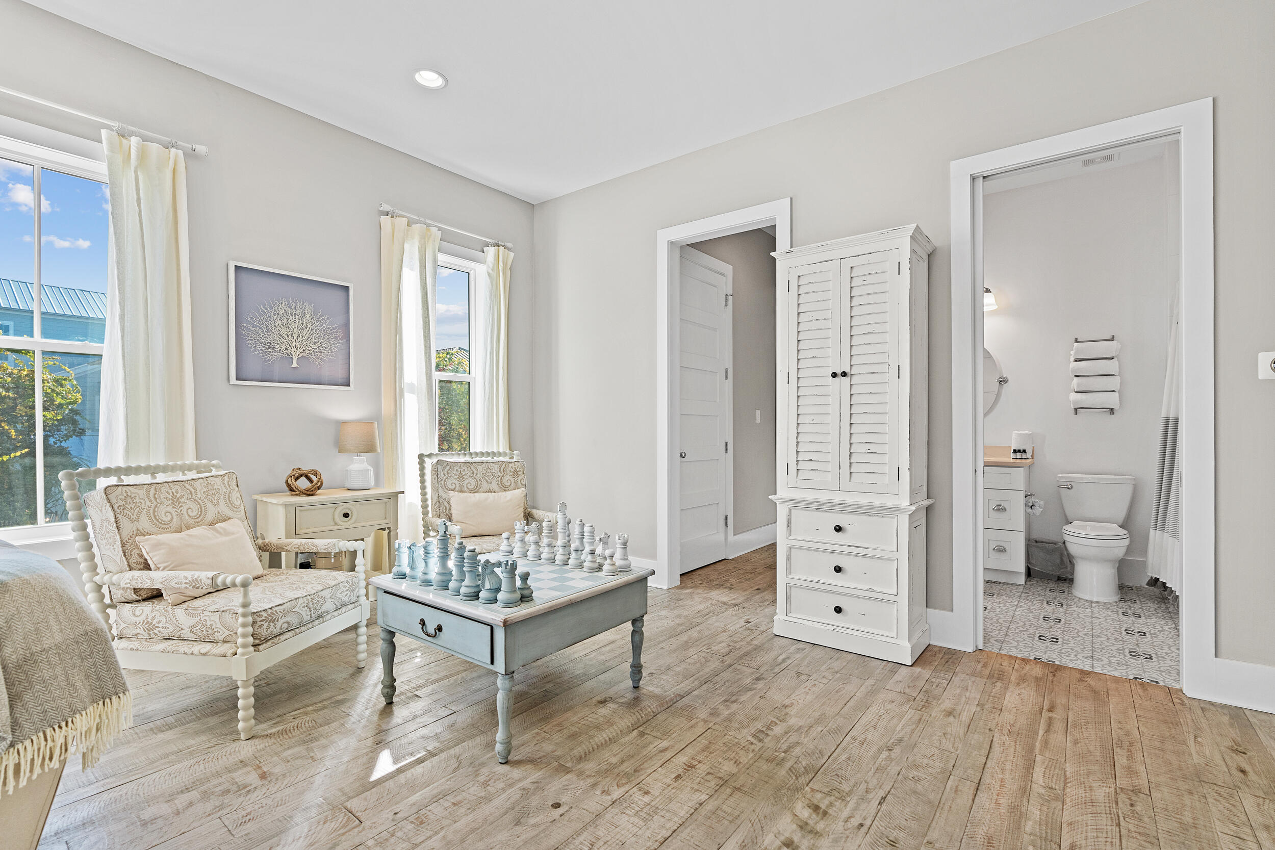 17 Pompano Court Inlet Beach, FL 32461 - Photo 22 of 48 a spacious bedroom with a bed and a couch