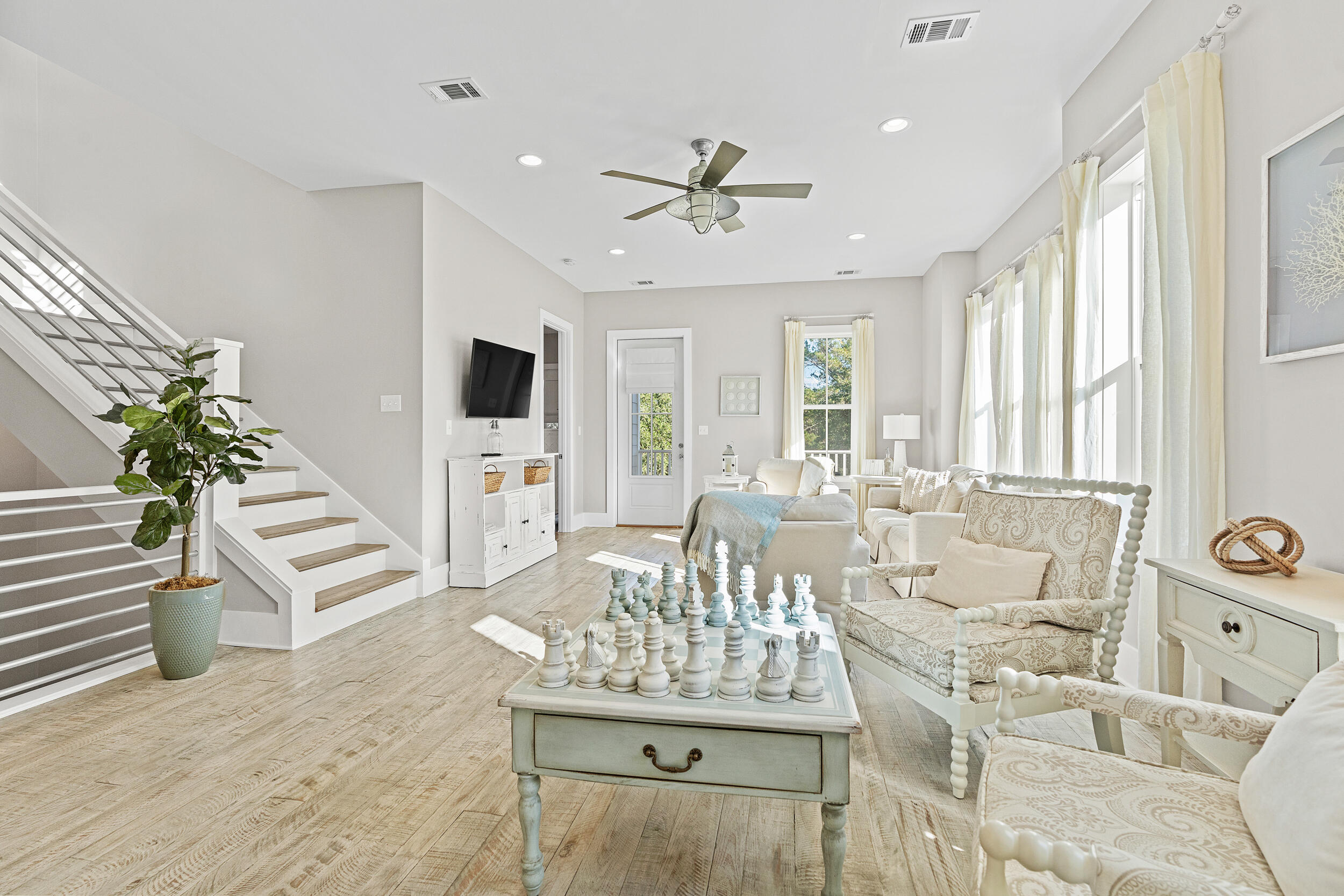 17 Pompano Court Inlet Beach, FL 32461 - Photo 23 of 48 a view of a dining room with furniture window and wooden floor