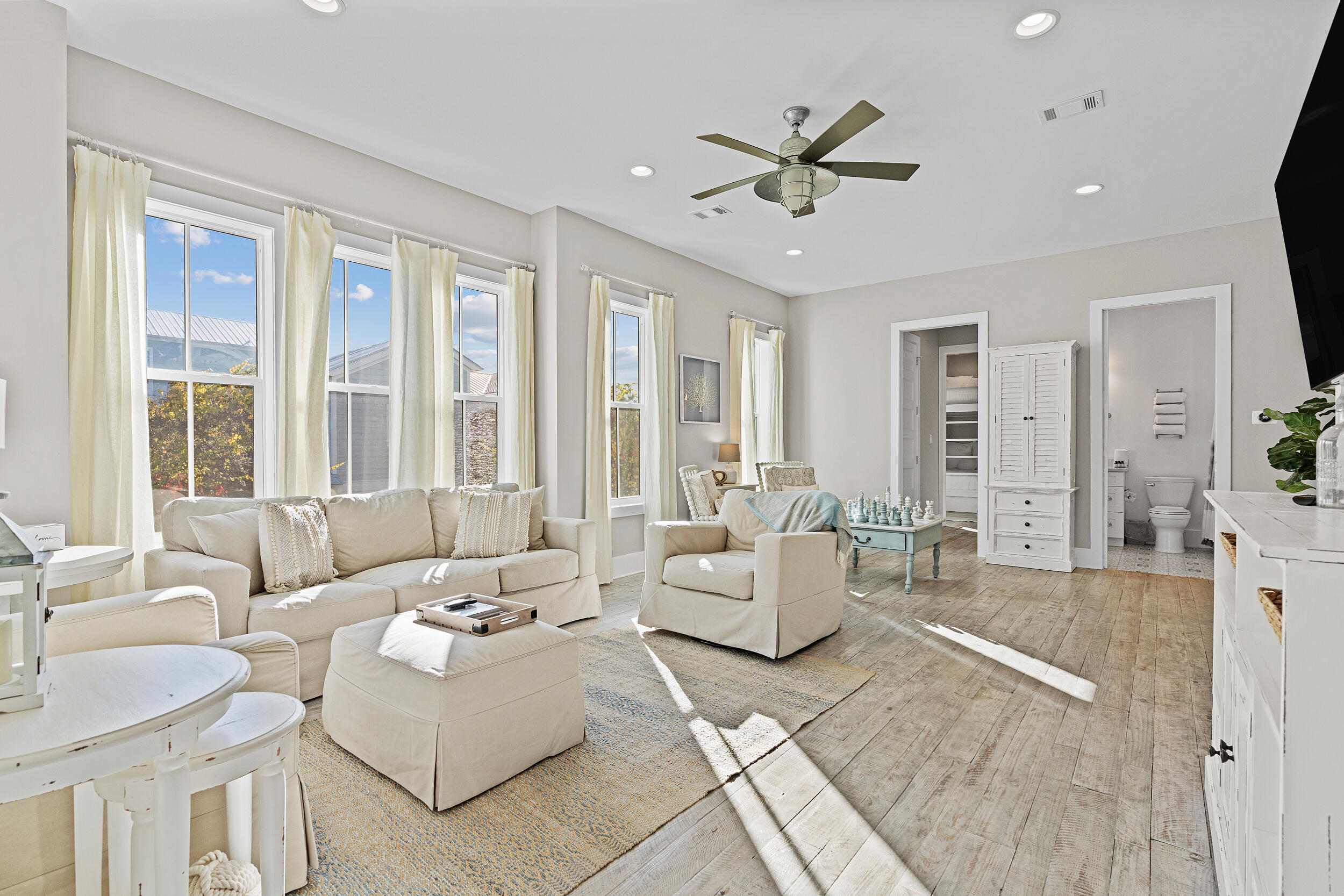 17 Pompano Court Inlet Beach, FL 32461 - Photo 24 of 48 a living room with furniture and a large window