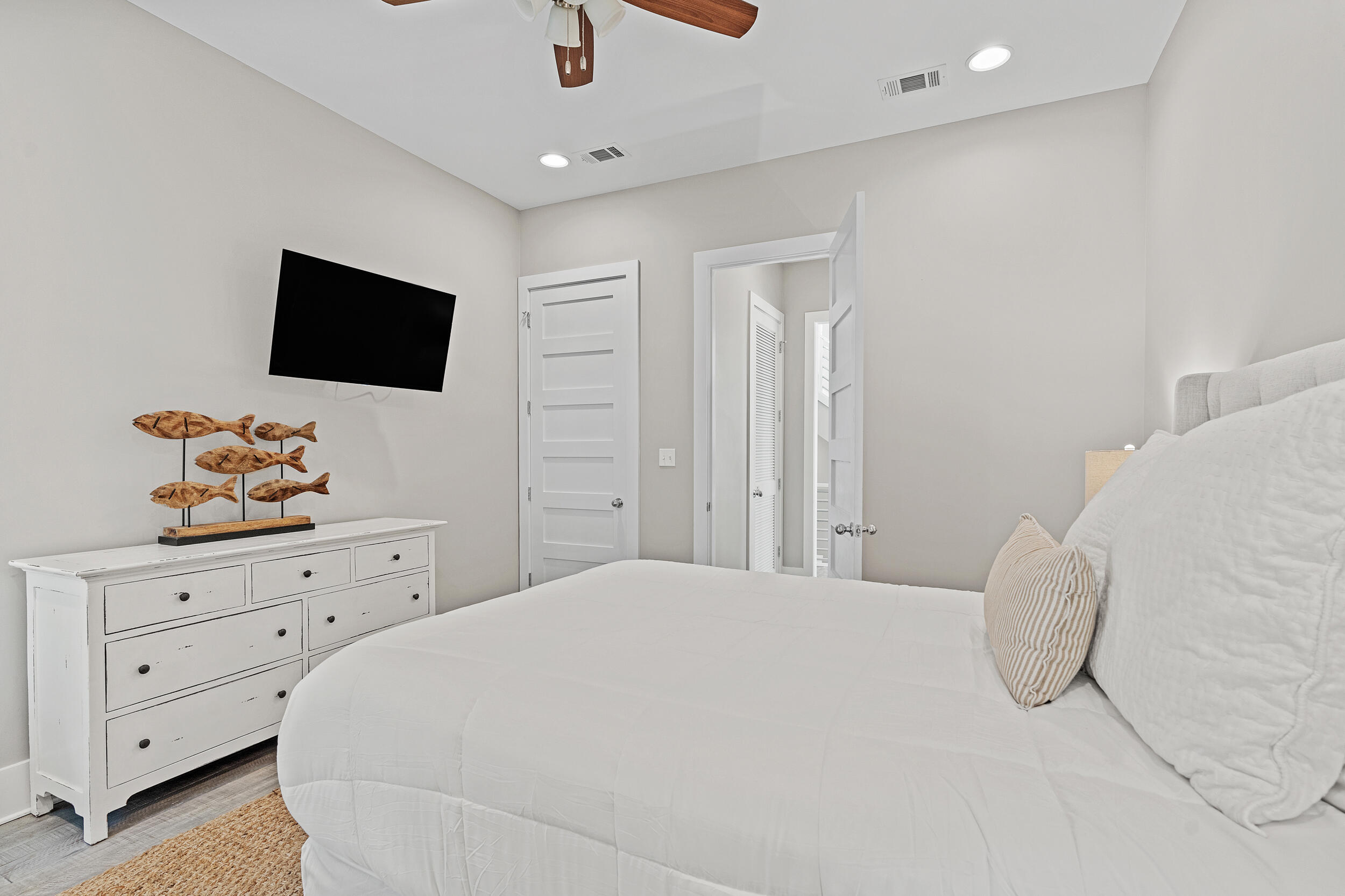 17 Pompano Court Inlet Beach, FL 32461 - Photo 25 of 48 a bedroom with a bed and a flat screen tv