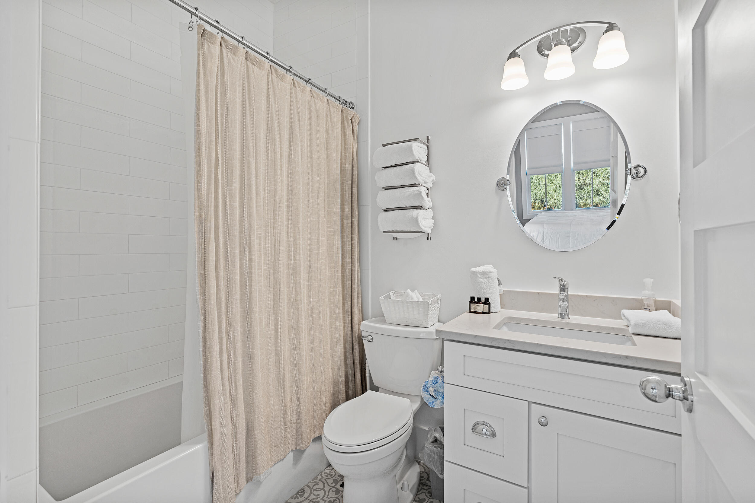 17 Pompano Court Inlet Beach, FL 32461 - Photo 29 of 48 a bathroom with a toilet sink and mirror