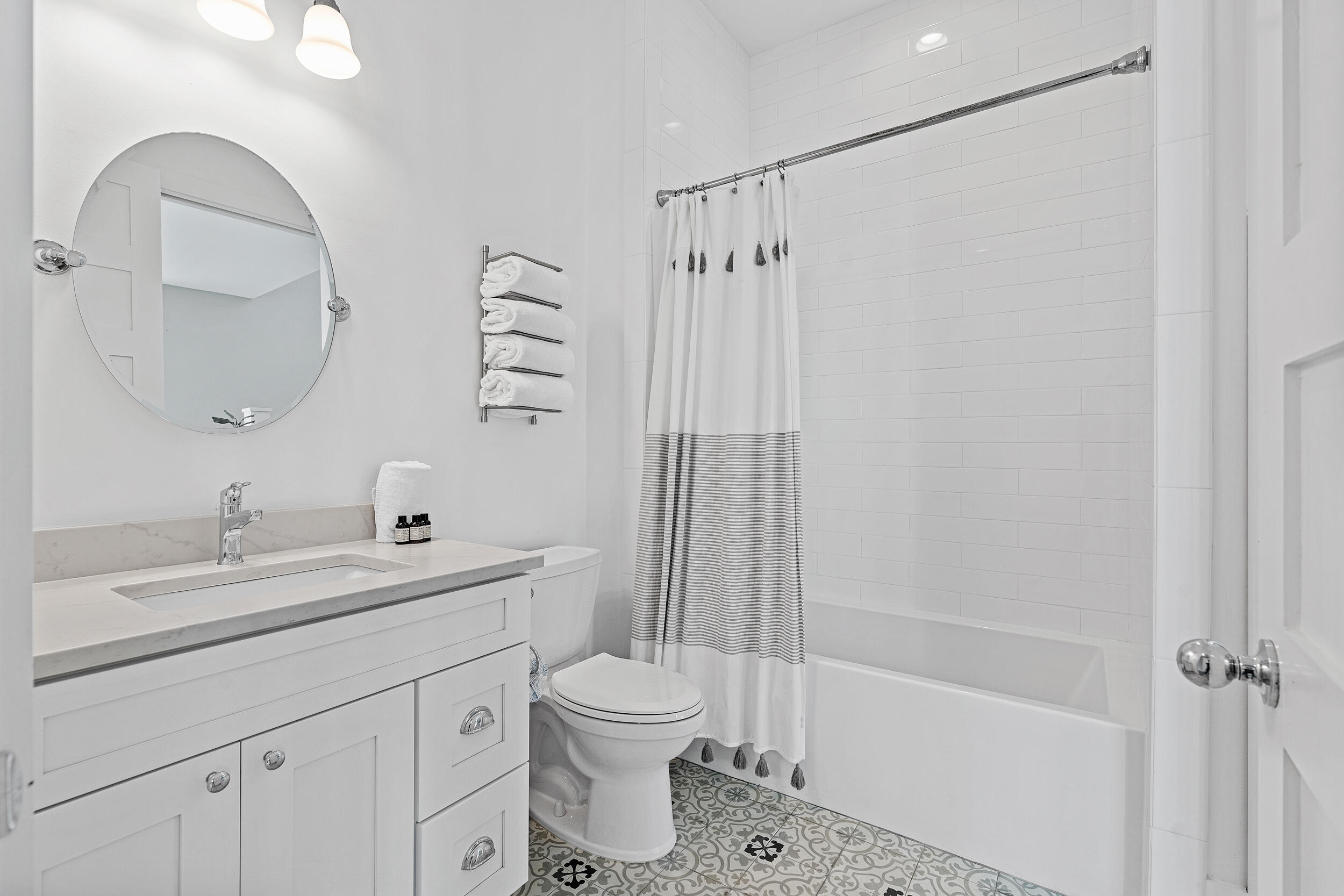 17 Pompano Court Inlet Beach, FL 32461 - Photo 32 of 48 a bathroom with a sink a toilet and a mirror