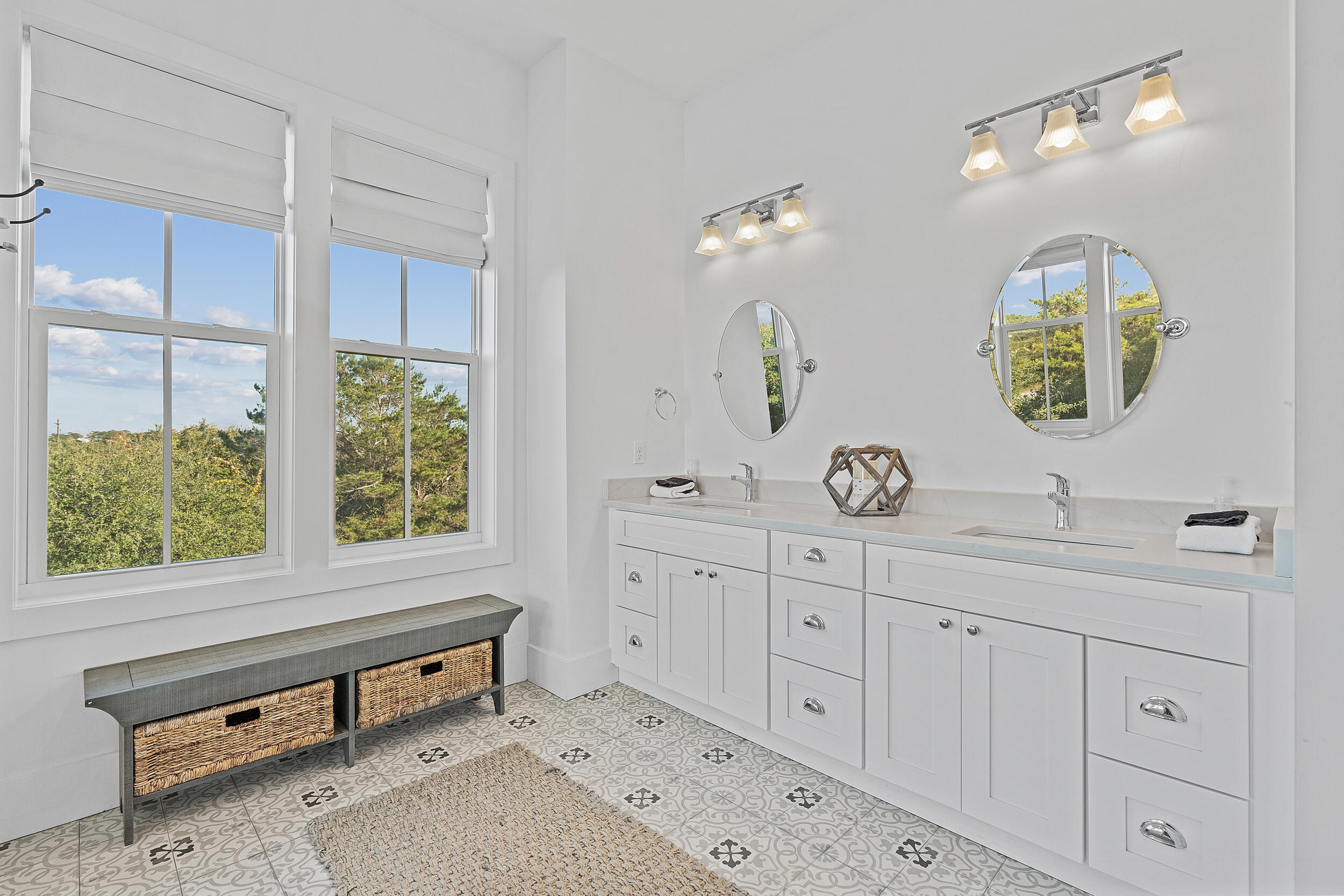 17 Pompano Court Inlet Beach, FL 32461 - Photo 39 of 48 a spacious bathroom with double vanity sink a two mirror a window and a bathtub