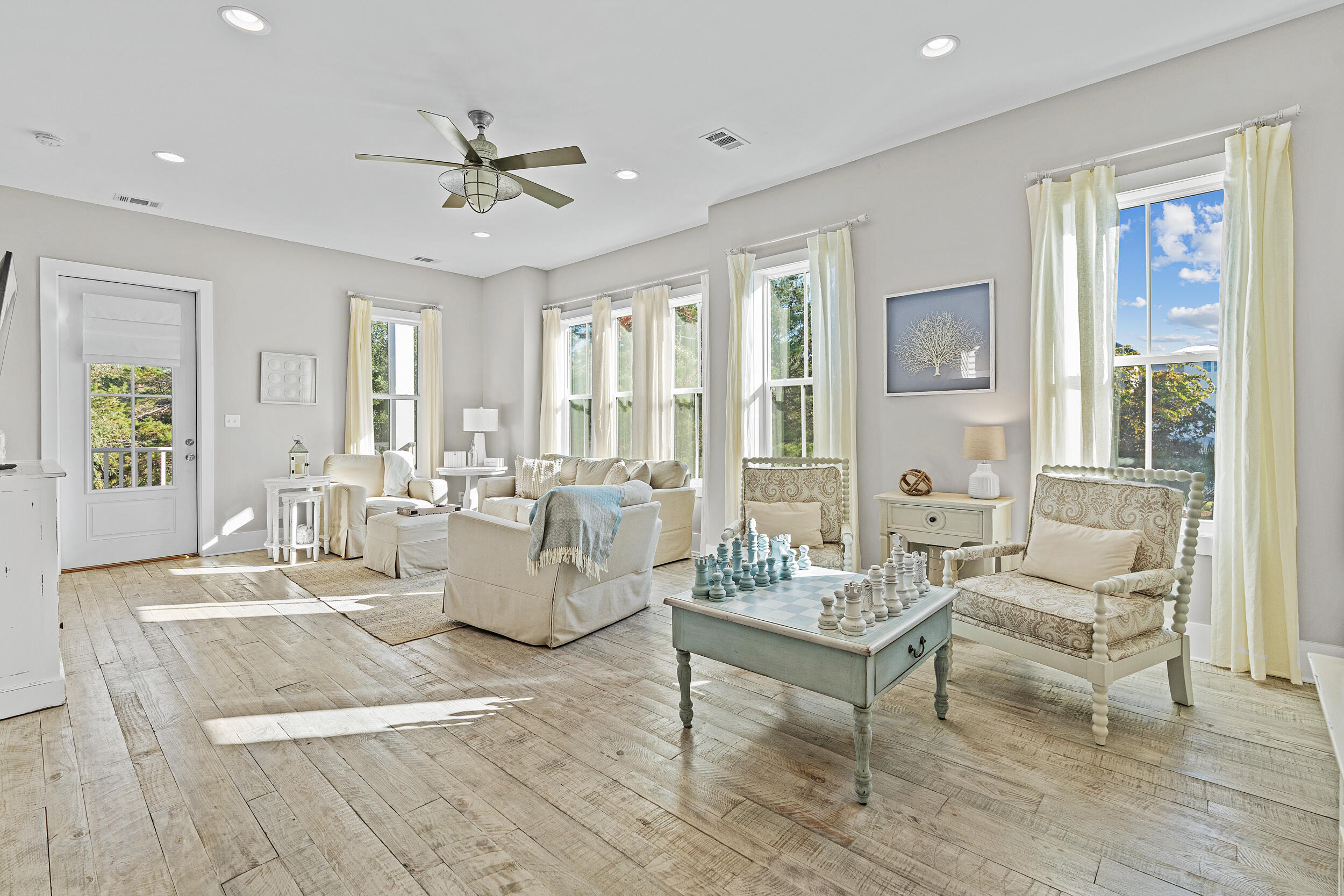 17 Pompano Court Inlet Beach, FL 32461 - Photo 10 of 48 a living room with furniture and a large window