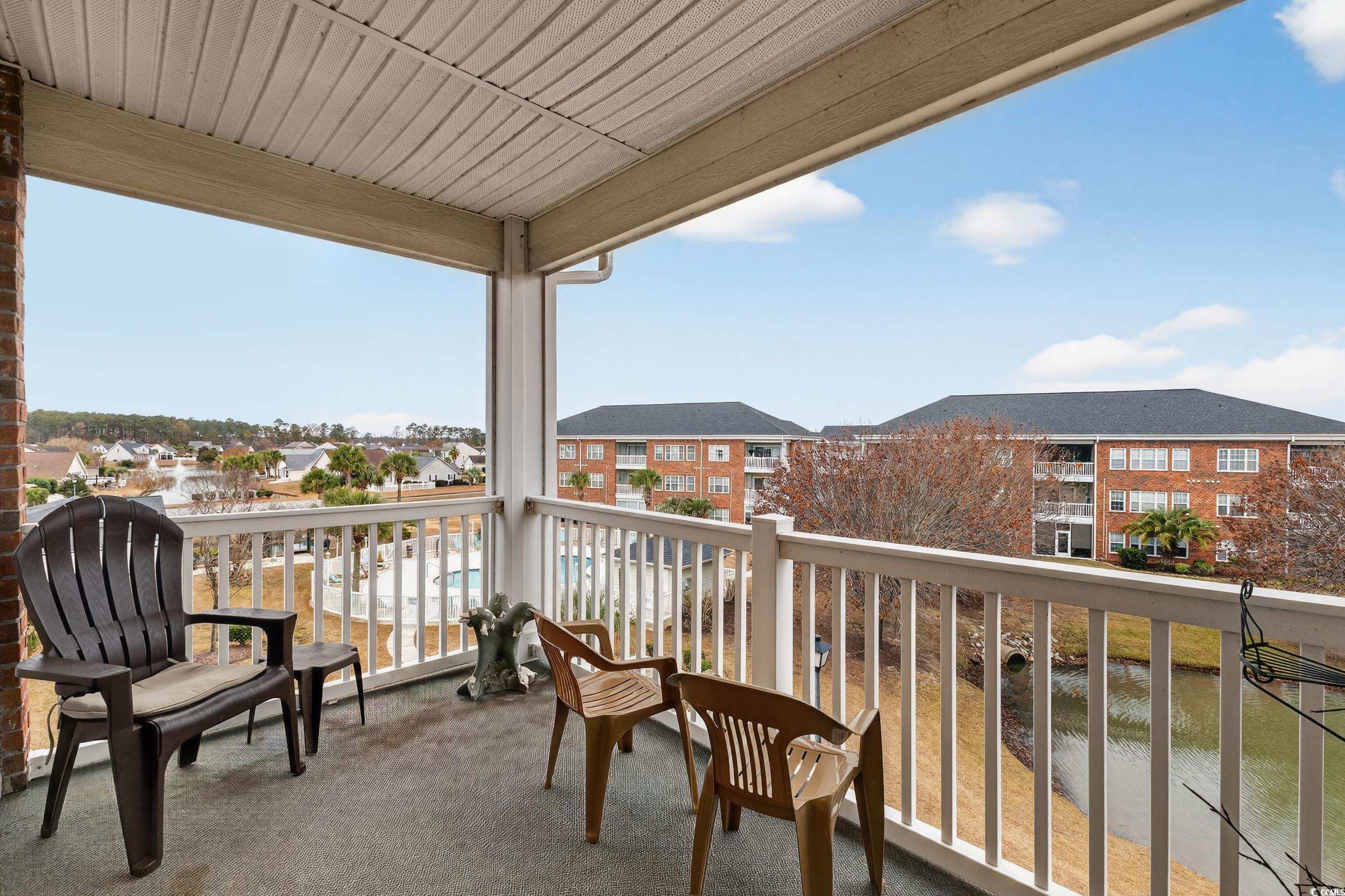 3915 Gladiola Court, Unit 301 Myrtle Beach, SC 29588 - Photo 20 of 24 Balcony featuring a residential view