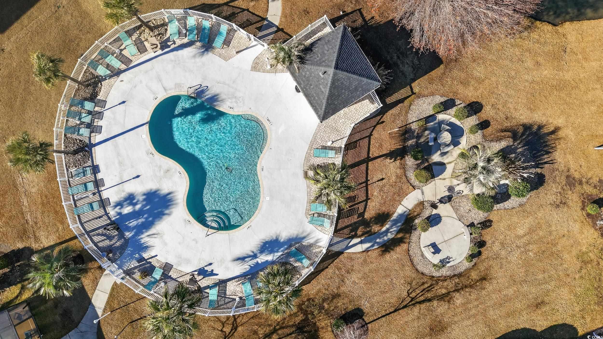 3915 Gladiola Court, Unit 301 Myrtle Beach, SC 29588 - Photo 22 of 24 Aerial view of a pool