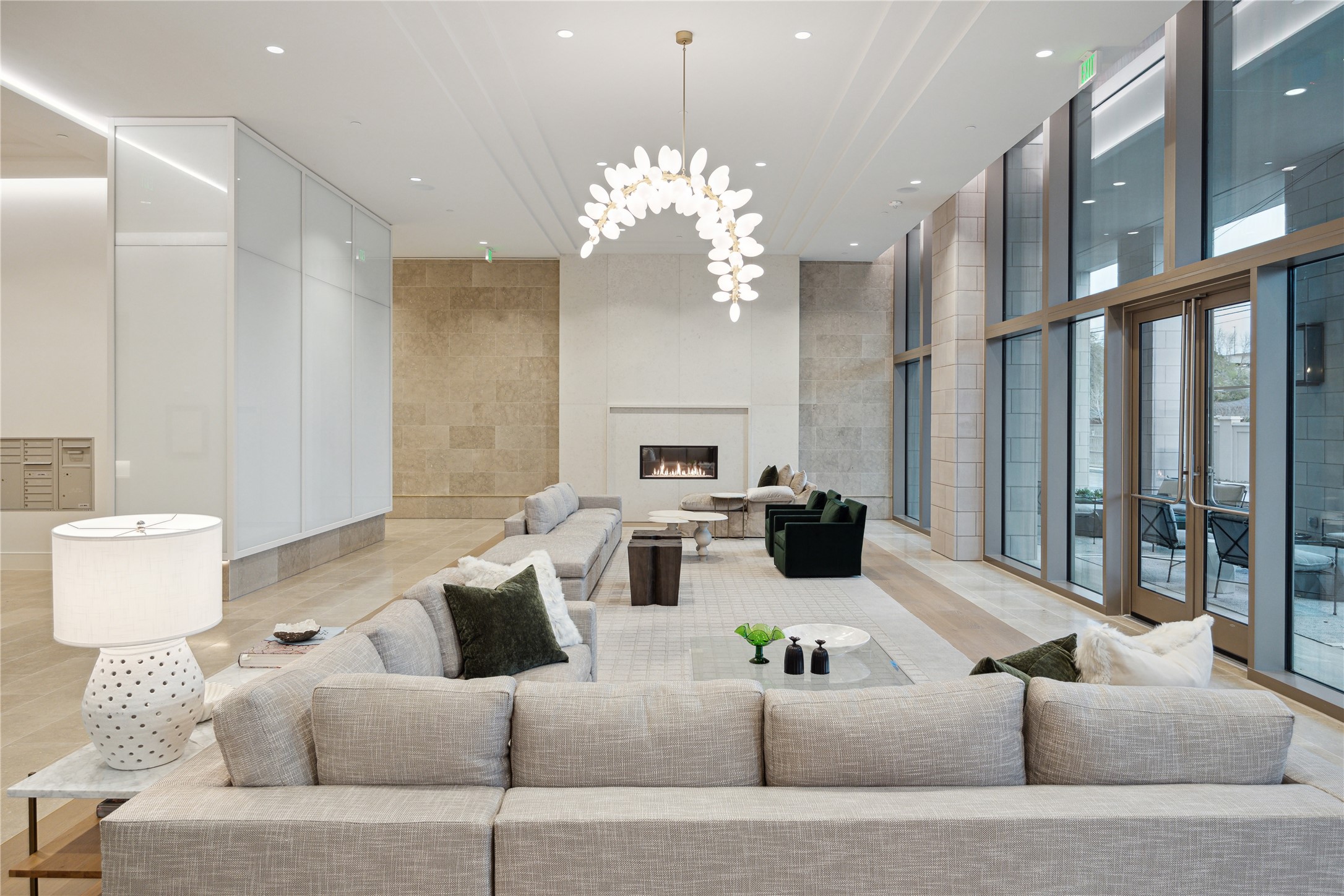 5656 San Felipe Street, Unit 701 Houston, TX 77056 - Photo 3 of 44 THE HAWTHORNE lobby. A welcoming first impression with a soft neutral color palette and comfortable seating areas areas arranged alongside a gas fireplace and floor to ceiling windows overlooking out outdoor covered lounge