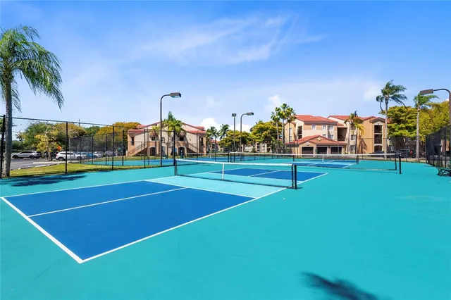 a view of swimming pool with lounge chair