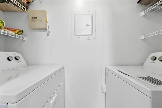 a bedroom with a bed and dresser