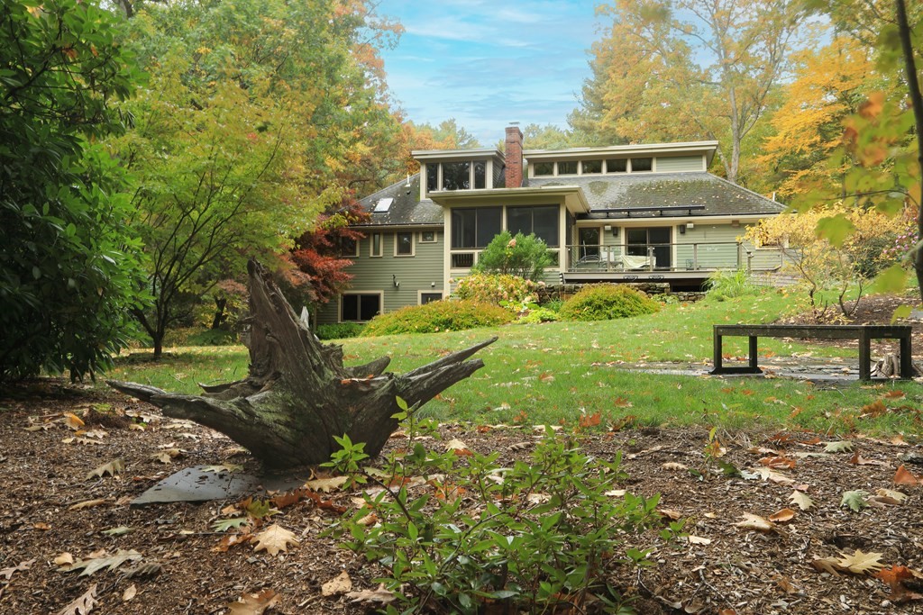 18 Willow Road Harvard, MA 01451 - Photo 2 of 35 a front view of house with yard and green space