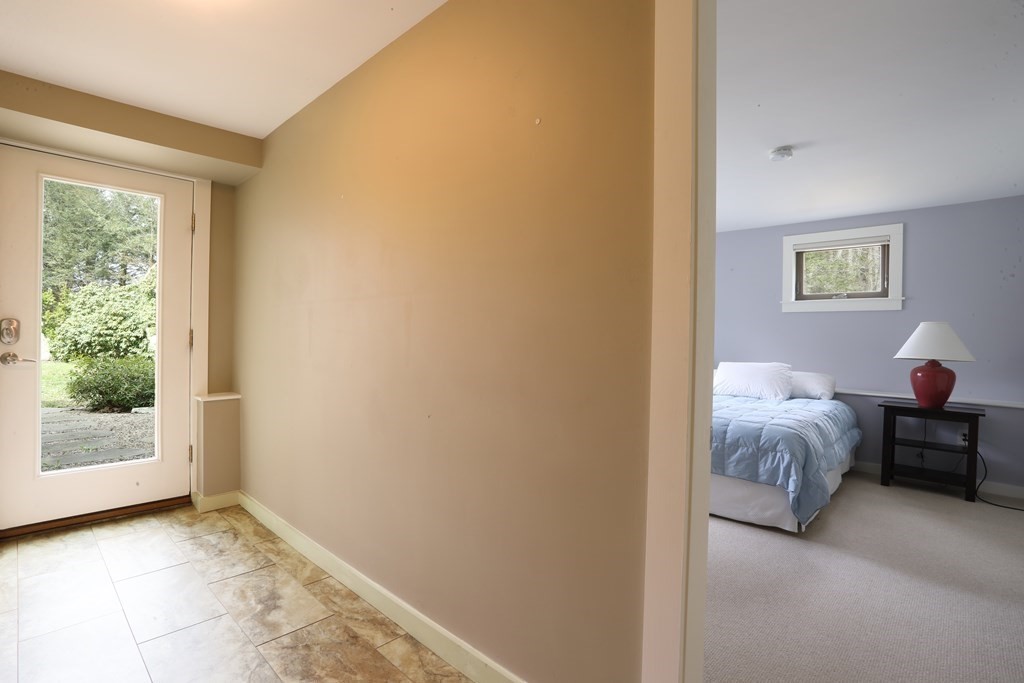 18 Willow Road Harvard, MA 01451 - Photo 30 of 35 a bedroom with a bed and a window