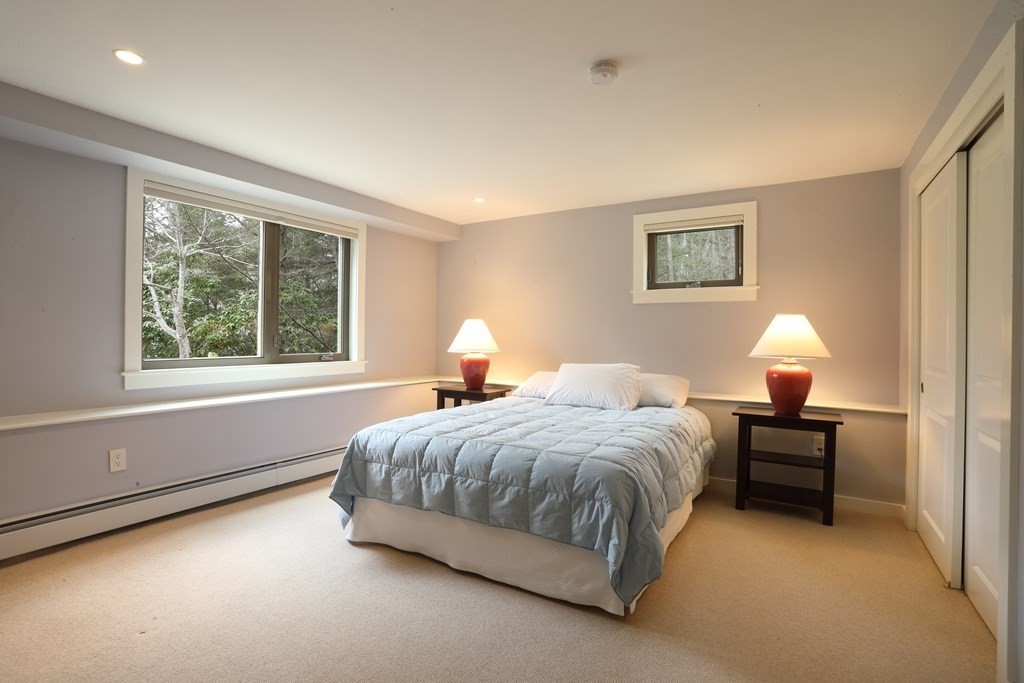 18 Willow Road Harvard, MA 01451 - Photo 31 of 35 a bed room with a bed and a window