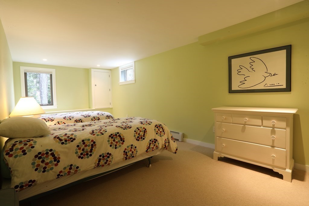 18 Willow Road Harvard, MA 01451 - Photo 32 of 35 a bedroom with a bed and dresser
