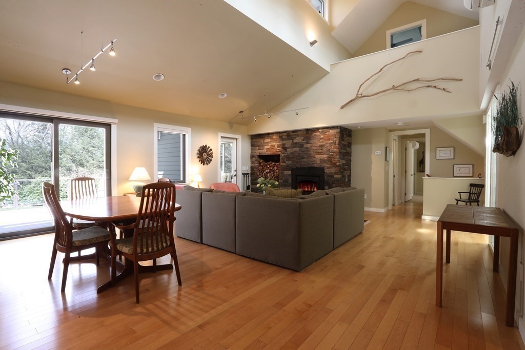 18 Willow Road Harvard, MA 01451 - Photo 6 of 35 a view of a dining room with furniture window and wooden floor