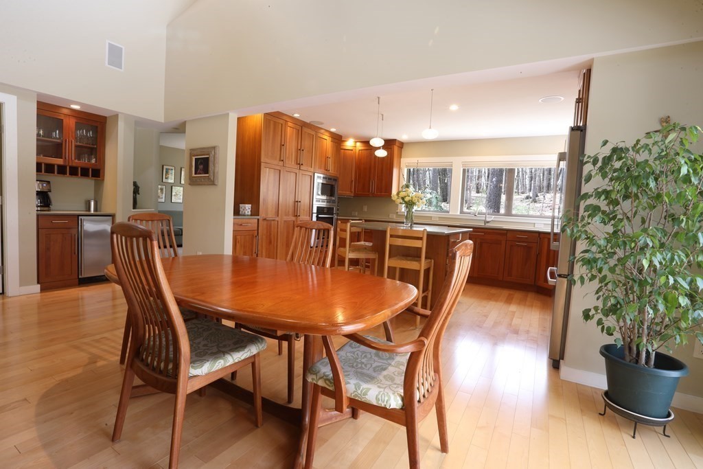18 Willow Road Harvard, MA 01451 - Photo 7 of 35 a dining room with furniture and wooden floor