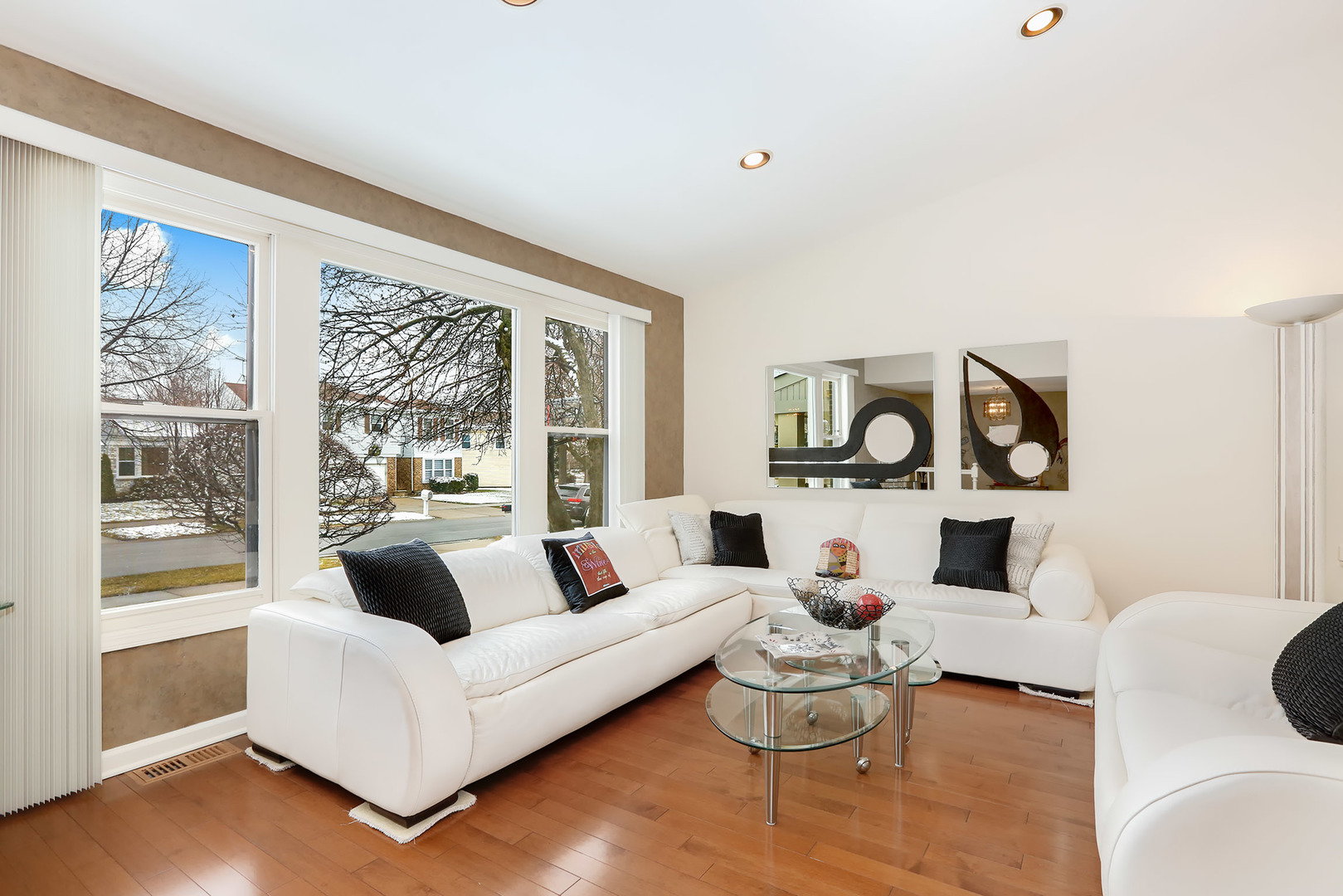 1341 Devonshire Road Buffalo Grove, IL 60089 - Photo 2 of 34 a living room with furniture and a large window