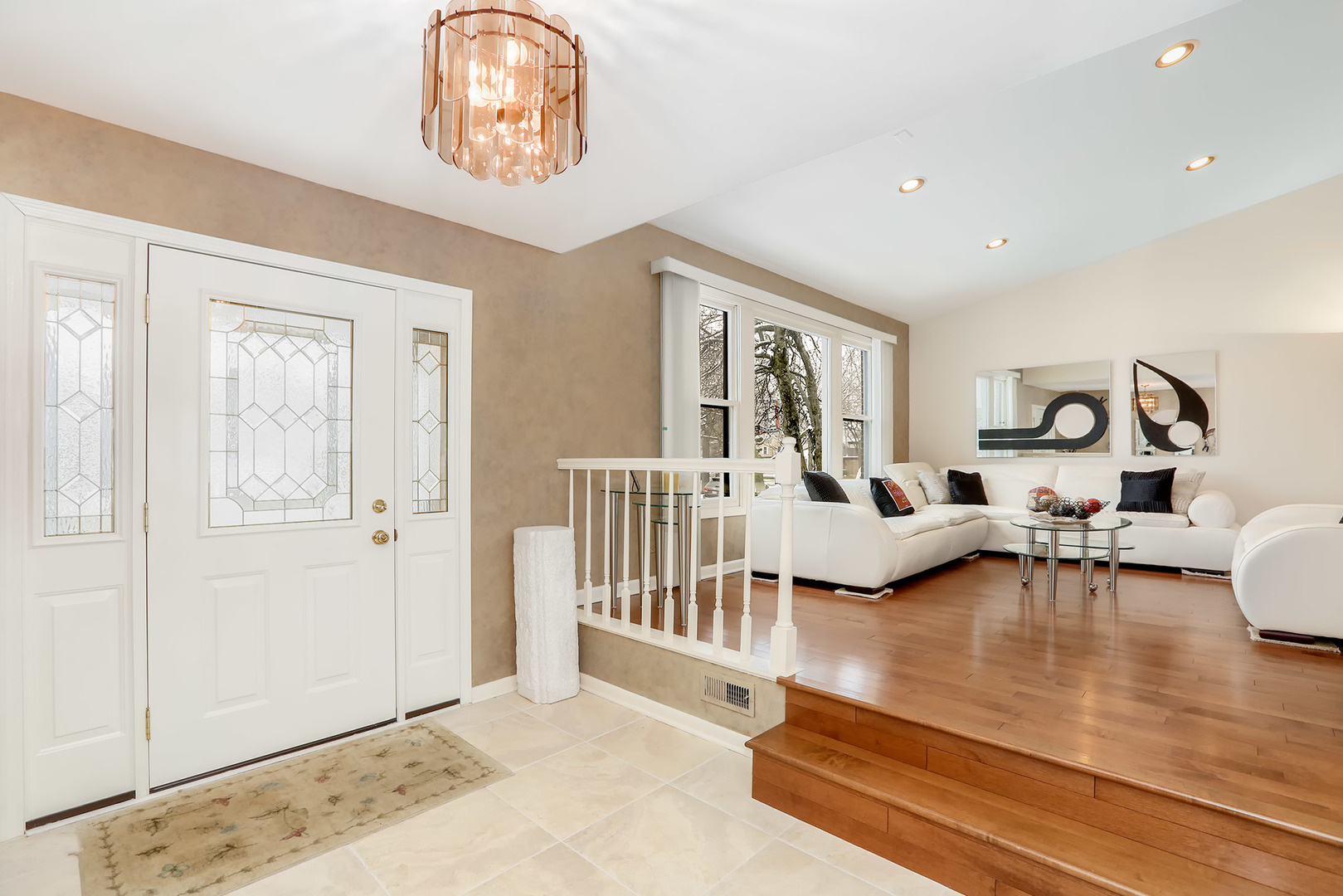 1341 Devonshire Road Buffalo Grove, IL 60089 - Photo 17 of 34 a living room with furniture and a table