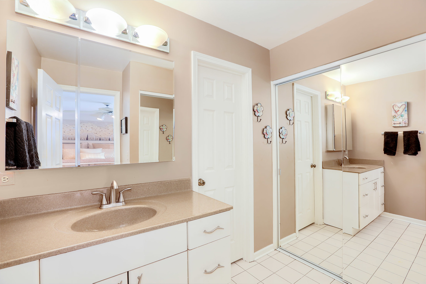1341 Devonshire Road Buffalo Grove, IL 60089 - Photo 24 of 34 a bathroom with a granite countertop sink and a mirror