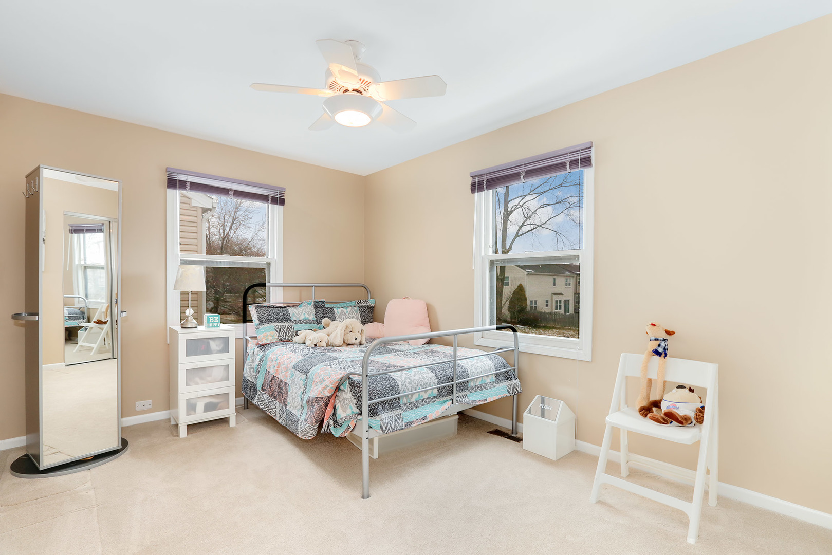 1341 Devonshire Road Buffalo Grove, IL 60089 - Photo 25 of 34 a bedroom with a bed and a window