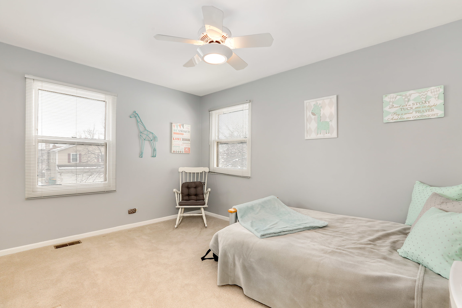 1341 Devonshire Road Buffalo Grove, IL 60089 - Photo 26 of 34 a bedroom with a bed dresser and a window