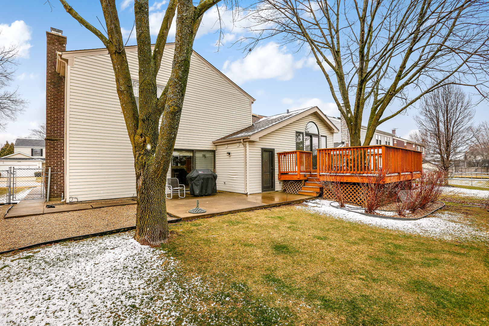 1341 Devonshire Road Buffalo Grove, IL 60089 - Photo 34 of 34 a view of a house with a large tree in front