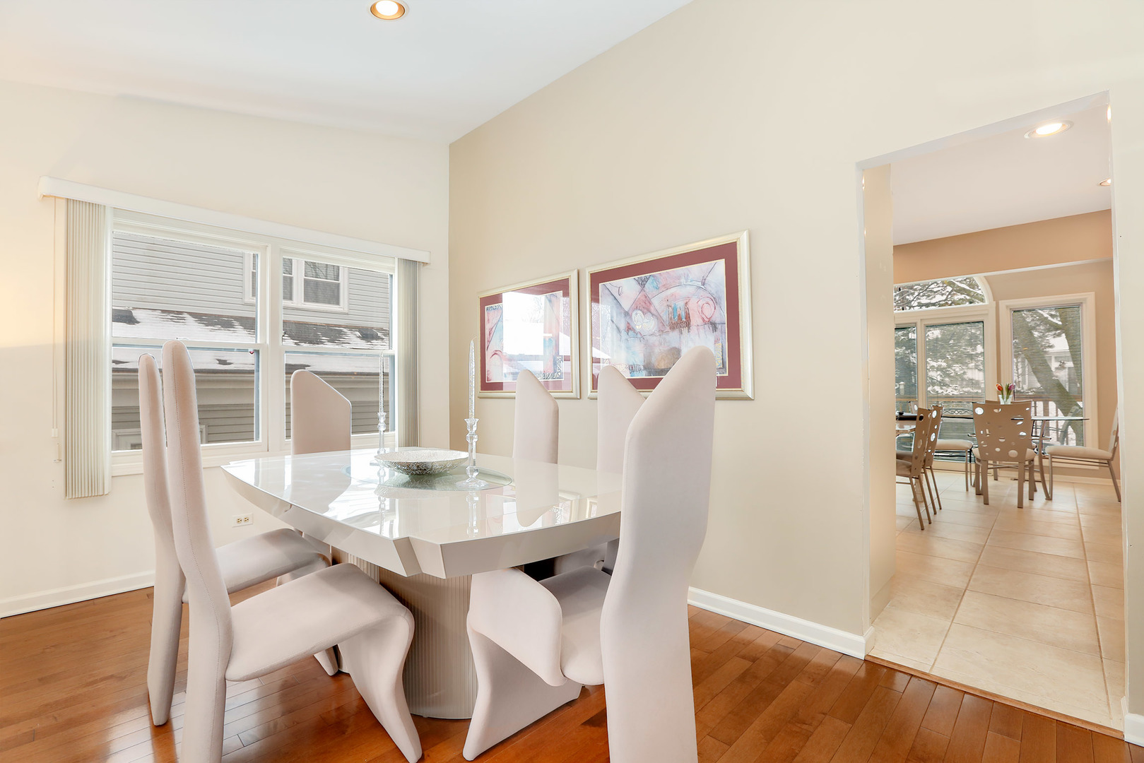1341 Devonshire Road Buffalo Grove, IL 60089 - Photo 9 of 34 a view of a dining room with furniture and wooden floor
