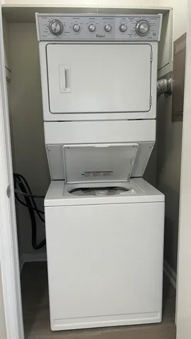 a view of house with backyard