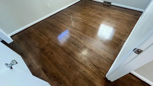 a view of balcony with wooden floor