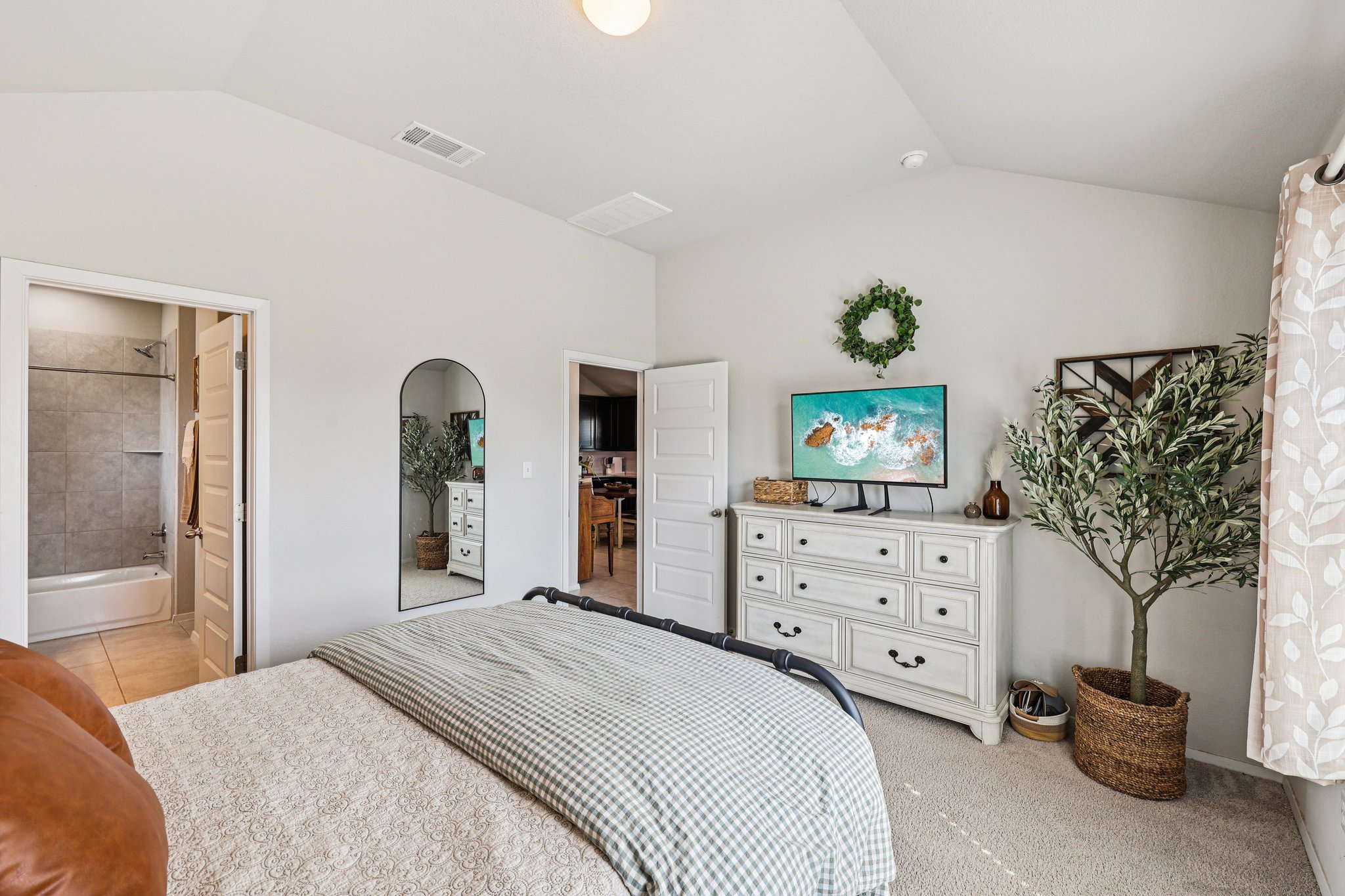 111 Insider Loop Elgin, TX 78621 - Photo 24 of 39 a bedroom with a bed and a dresser
