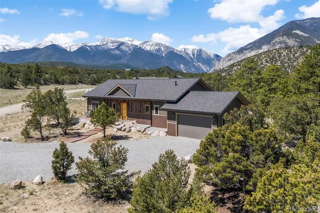 a view of house with outdoor space and river