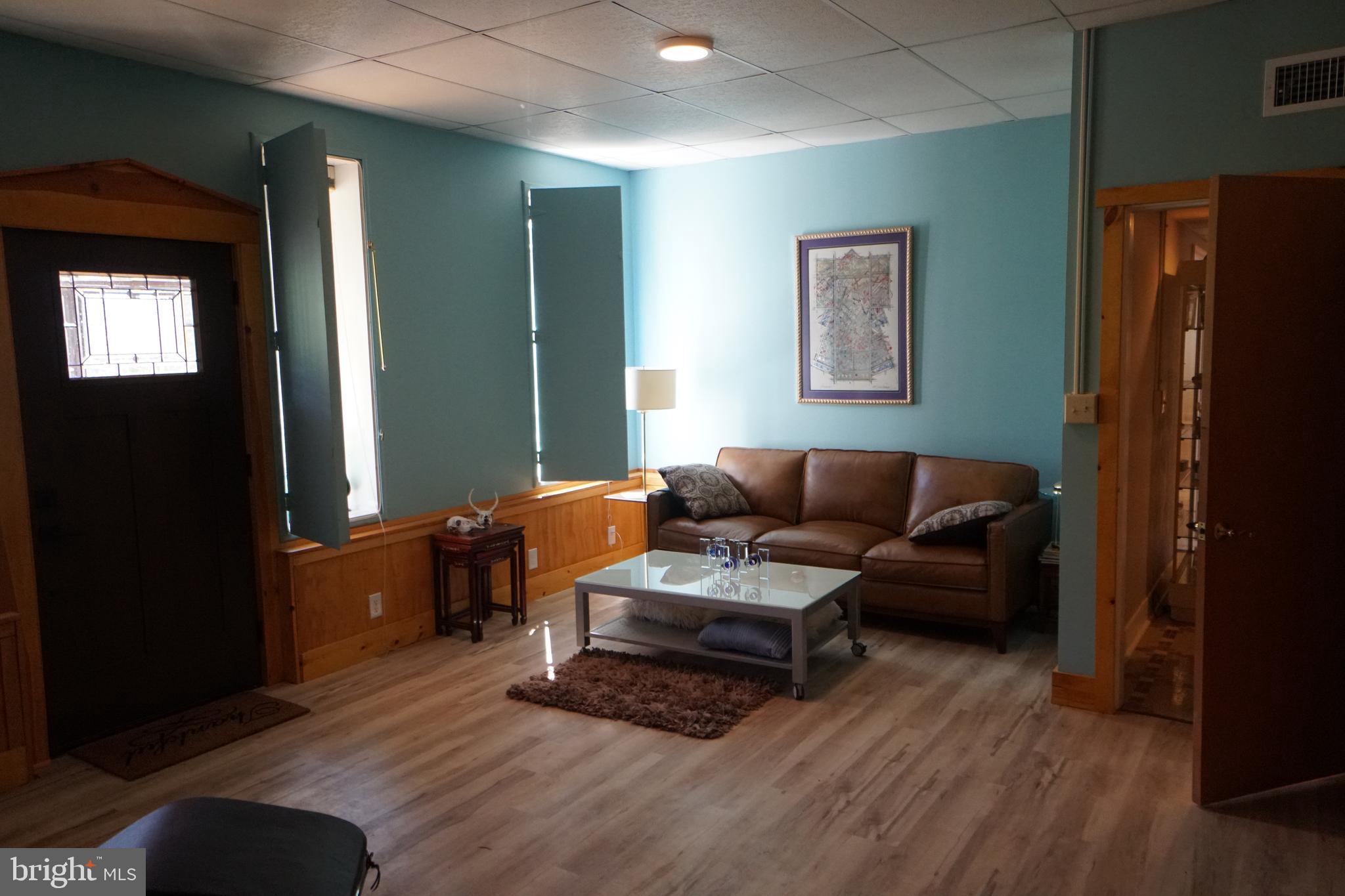 1873 Capito Hill Road Franklin, WV 26807 - Photo 43 of 72 a living room with furniture and a wooden floor