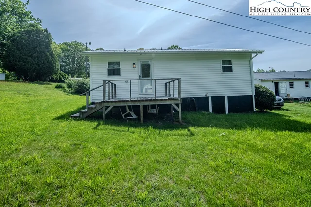 a view of a couches in backyard of house