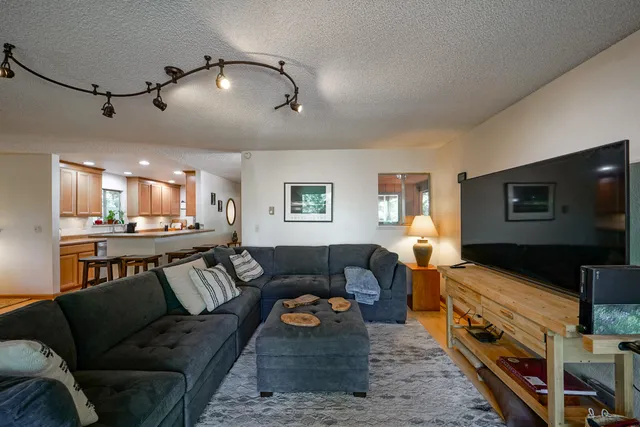 a white toilet sitting next to a window