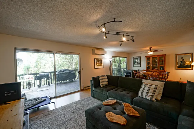 a view of a living room and dining room
