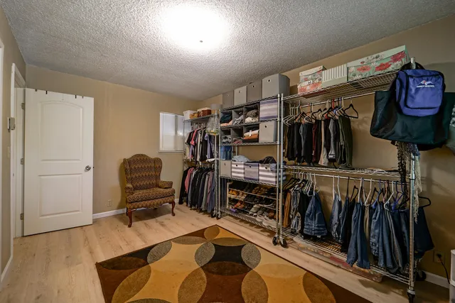 a view of balcony with wooden floor