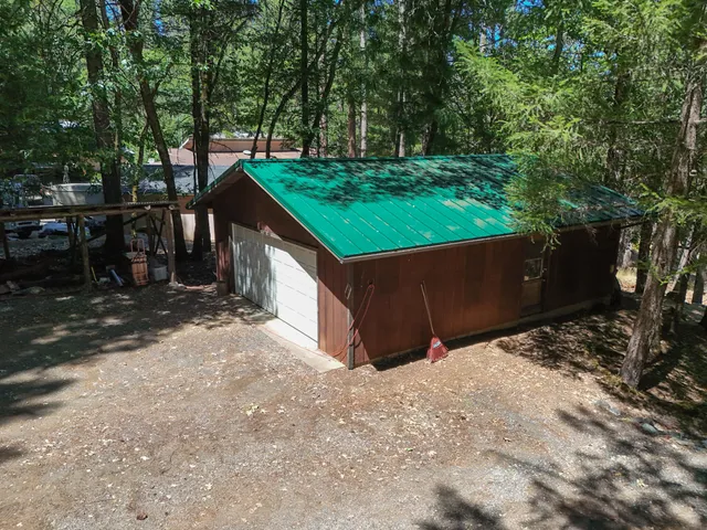 a large kitchen with a table and chairs