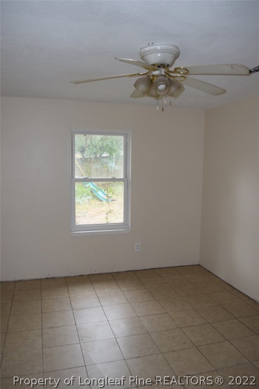 1796 Arrow Ridge Way Fayetteville, NC 28304 - Photo 12 of 15 a view of an empty room with a window
