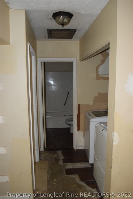 1796 Arrow Ridge Way Fayetteville, NC 28304 - Photo 13 of 15 a en suite bathroom with a sink and a mirror
