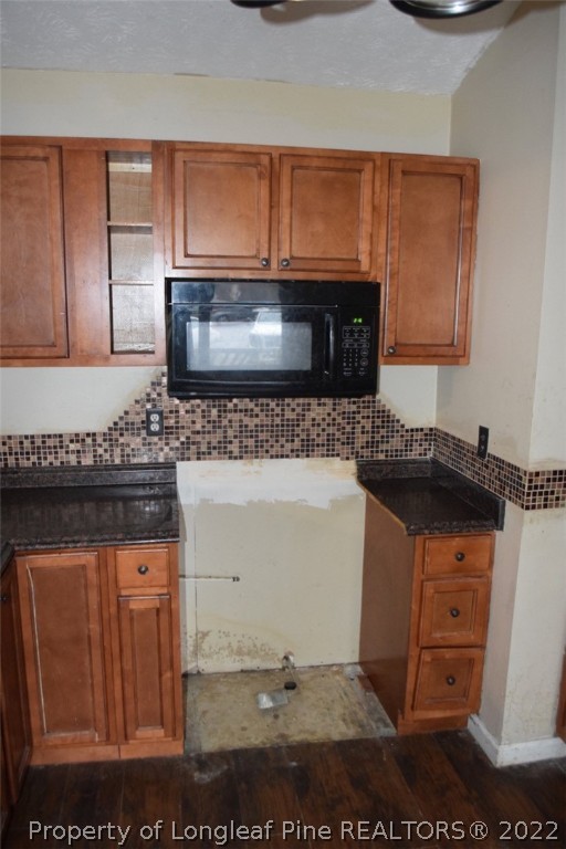 1796 Arrow Ridge Way Fayetteville, NC 28304 - Photo 7 of 15 a kitchen with stainless steel appliances granite countertop a sink stove and microwave